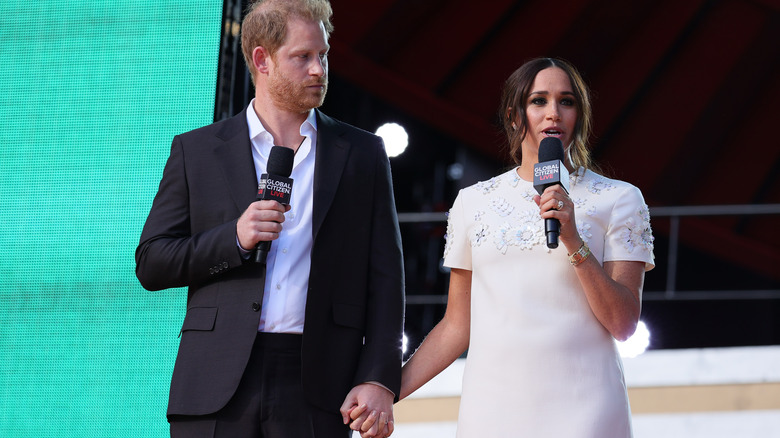 Le prince Harry et Meghan Markle sur scène