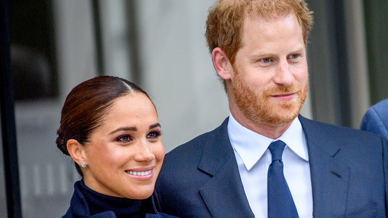 Meghan Markle et le prince Harry sourient