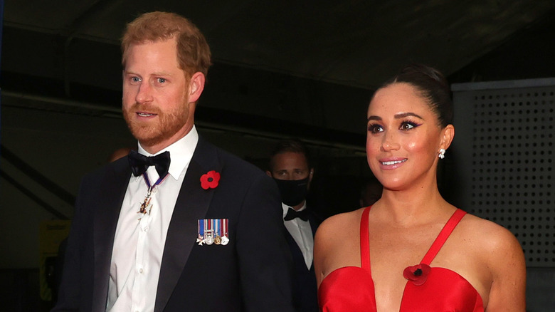 Le prince Harry et Meghan Markle lors d'un événement 