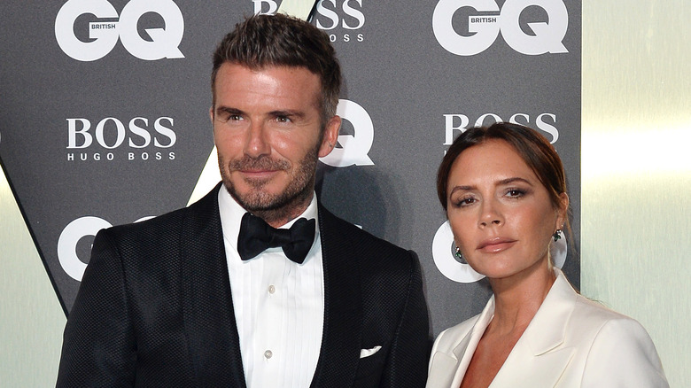 David Beckham et Victoria Beckham posant ensemble