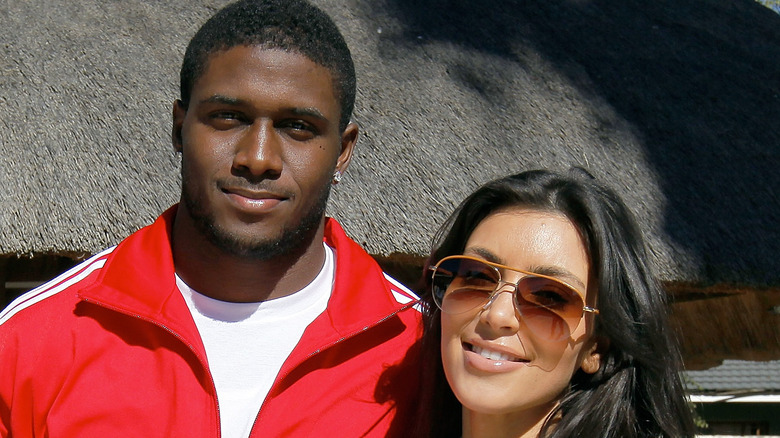 Reggie Bush et Kim Kardashian sourient