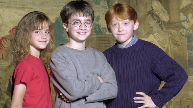 Emma Watson, Daniel Radcliffe et Rupert Grint souriant