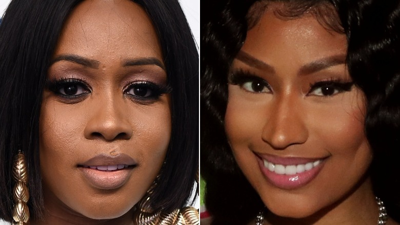 Remy Ma en boucles d'oreilles en or, Nicki Minaj souriant