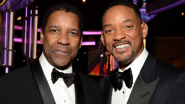 Denzel Washington et Will Smith souriant 