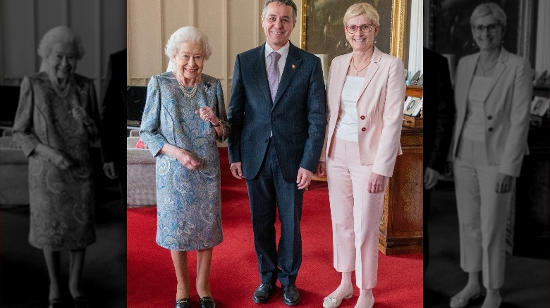 La reine Elizabeth, Ignazio Cassis et Paola Cassis souriant