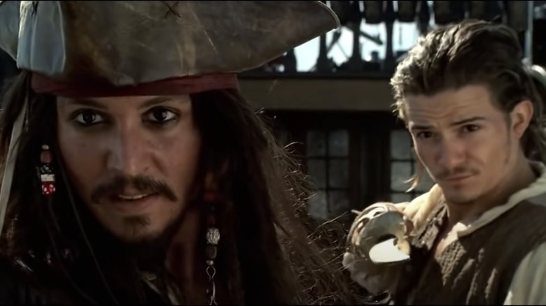 Johnny Depp avec Orlando Bloom dans "Pirates des Caraïbes"