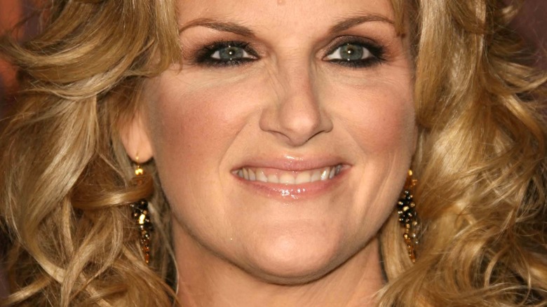 Le rôle que vous avez oublié que Trisha Yearwood a joué dans JAG