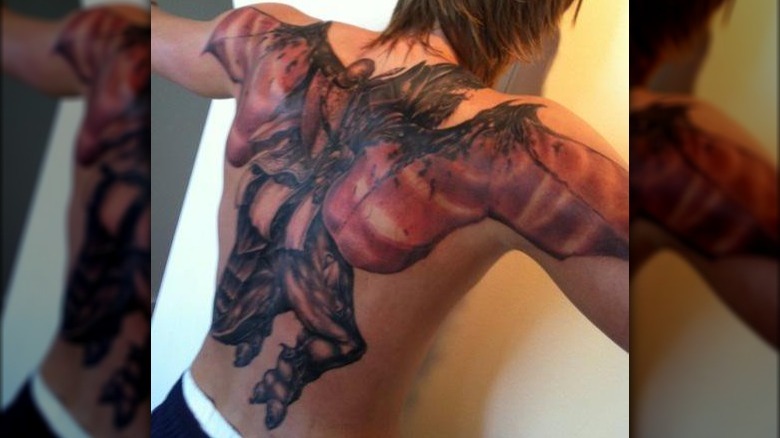 Andrei Kirilenko sur le dos du tatouage de World of Warcraft