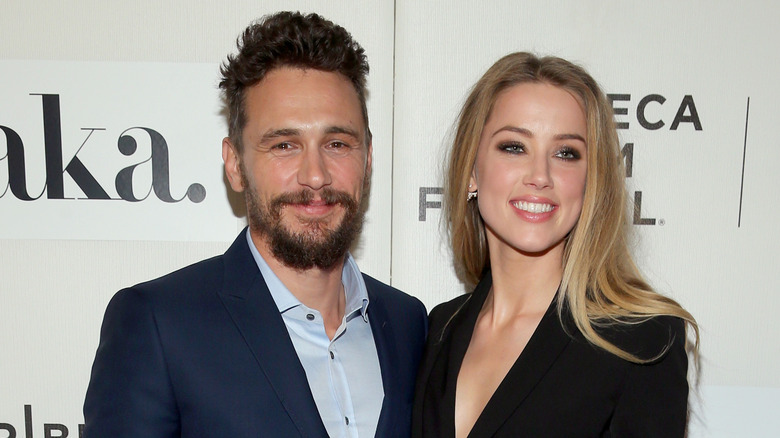 James Franco Amber Heard posant