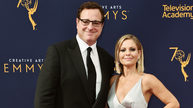 Candace Cameron Bure et Bob Saget posent 