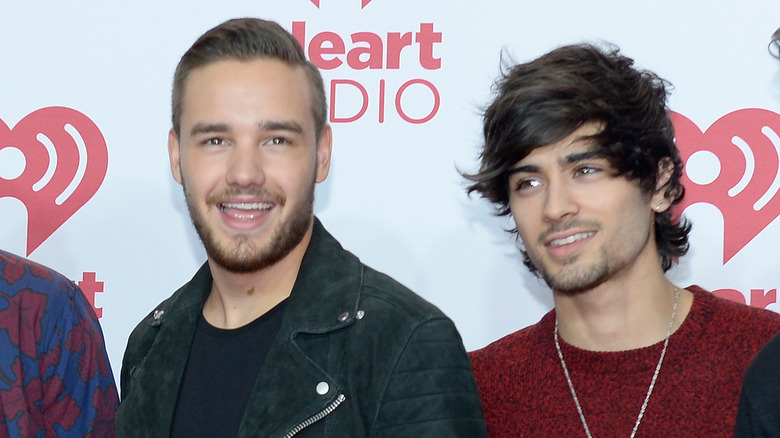 Liam Payne et Zayn Malik sourient