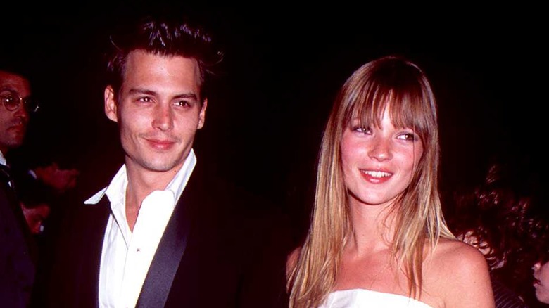 Johnny Depp et Kate Moss souriants