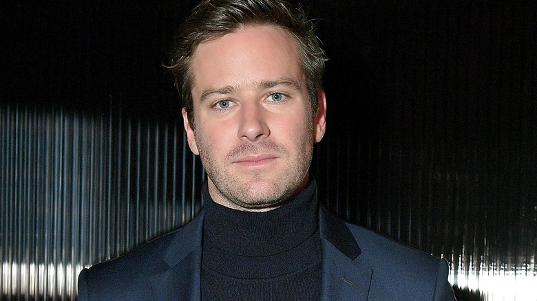 Armie Hammer posant