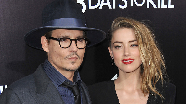 Johnny Depp et Amber Heard assistent à la première de "3 Days to Kill"