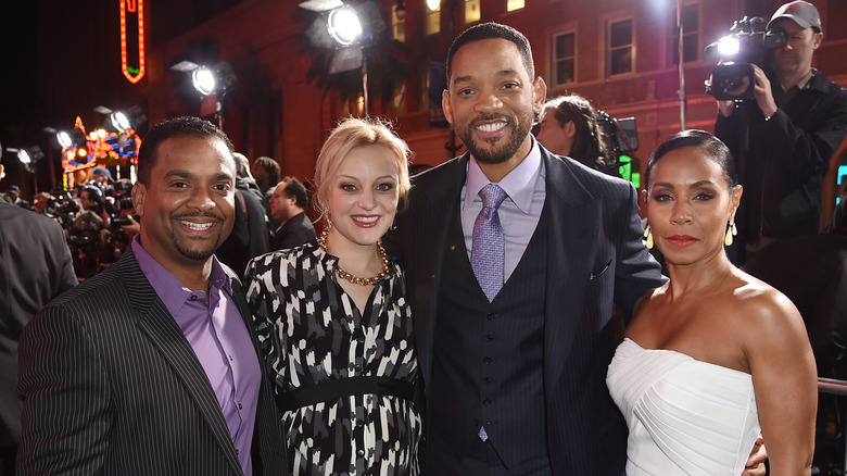 Alfonso Rebeiro, Angela Unkrich, Will Smith et Jada Pinkett Smith posant