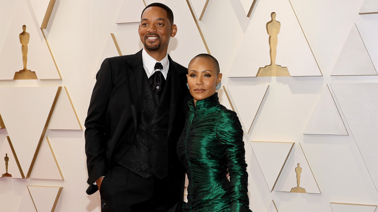 Will Smith et Jada Pinkett Smith sourient