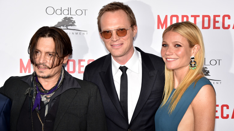 Johnny Depp, Paul Bettany et Gwyneth Paltrow posent