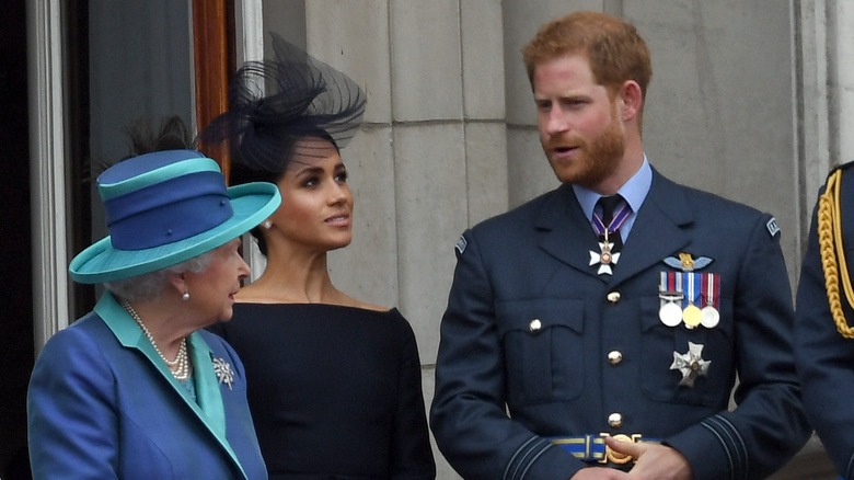 Le prince Harry et Meghan Markle avec la reine Elizabeth