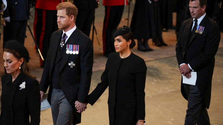 Prince Harry, Meghan Markle main dans la main