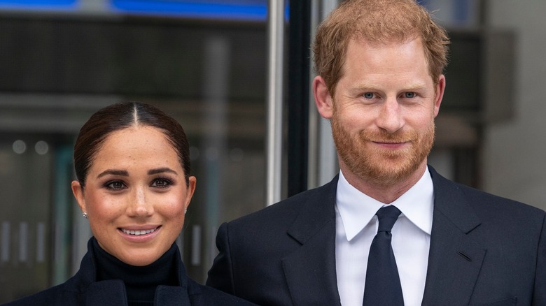 Meghan Markle et le prince Harry sourient