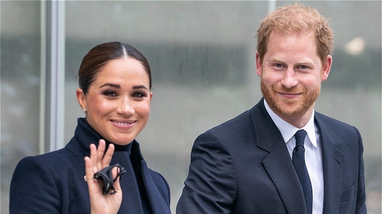 Meghan Markle et le prince Harry sourient