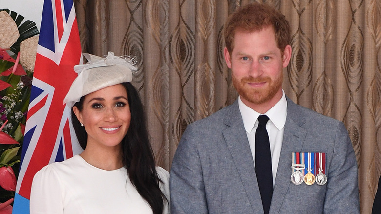 Meghan Markle, le prince Harry posant