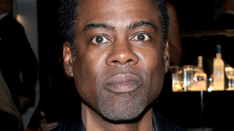 Chris Rock sourit