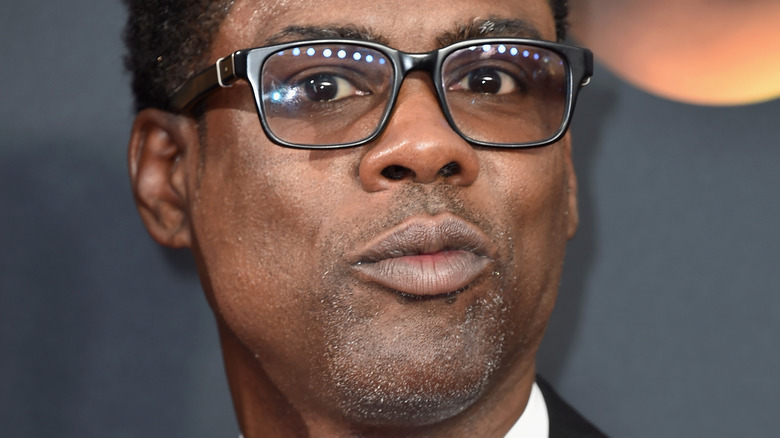 Chris Rock sourit