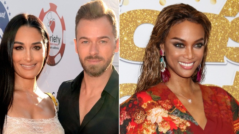 Nikki Bella, Artem Chigvintsev et Tyra Banks posent