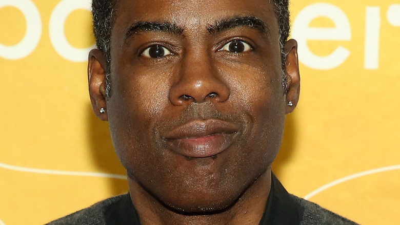 Chris Rock posant