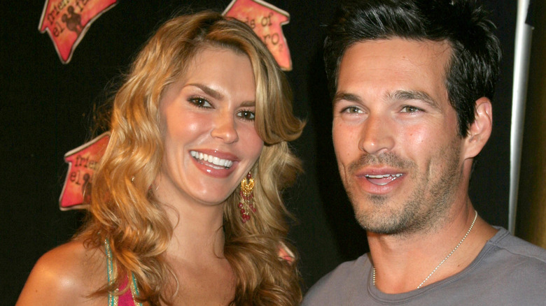 Brandi Glanville souriante avec Eddie Cibrian