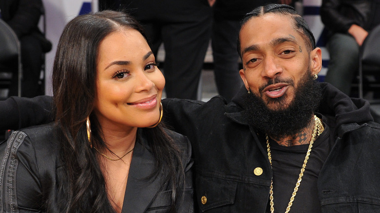 Lauren London et Nipsey Hussle sourient