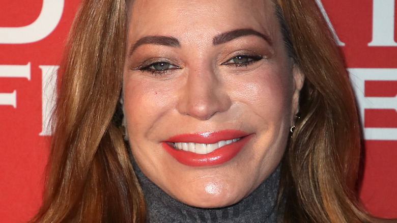 Taylor Dayne souriant