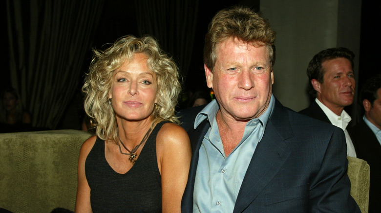 Farrah Fawcett et Ryan O'Neal assis en 2003