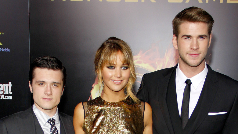 Liam Hemsworth, Jennifer Lawrence et Josh Hutcherson sur le tapis rouge