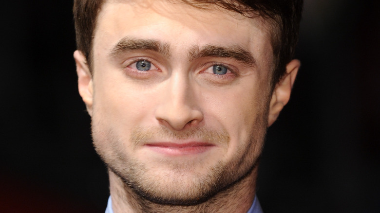 Daniel Radcliffe souriant pour une photo