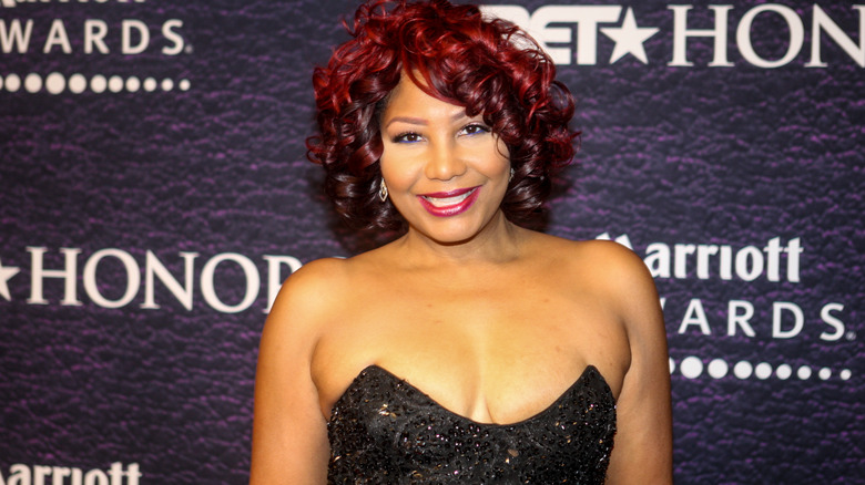 Traci Braxton souriant