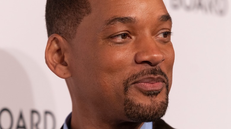 Will Smith jetant un coup d'œil