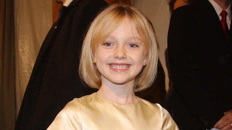 Dakota Fanning souriant