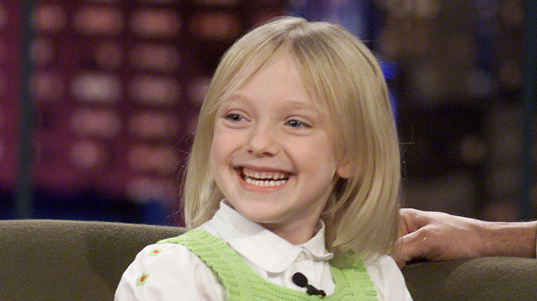 Dakota Fanning souriant