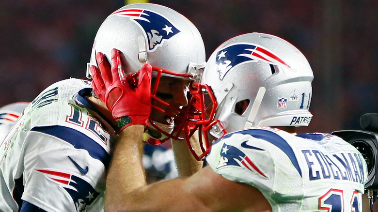 Julian Edelman avec Tom Brady