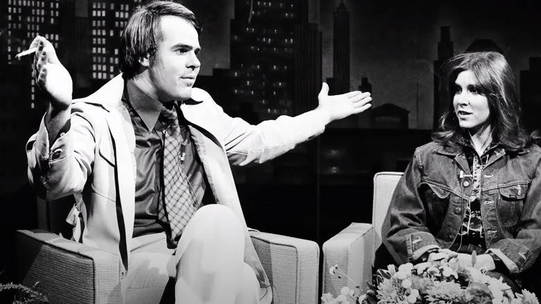 Dan Aykroyd et Carrie Fisher assis