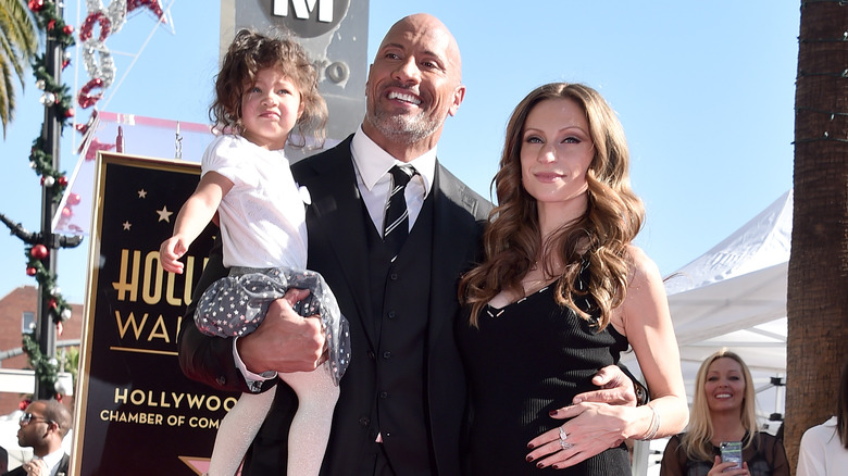 Dwayne Johnson et Lauren Hashian avec leur fille