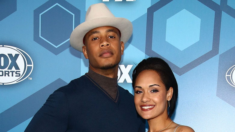 Grace Byers et Trai Byers posant lors d'un événement