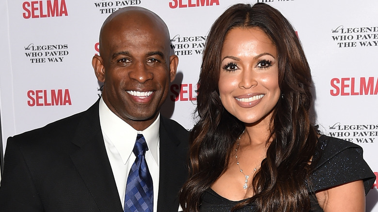 Deion Sanders et Tracey Edmonds posant