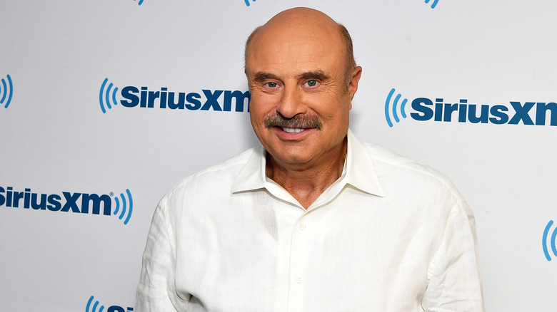 Dr Phil McGraw souriant