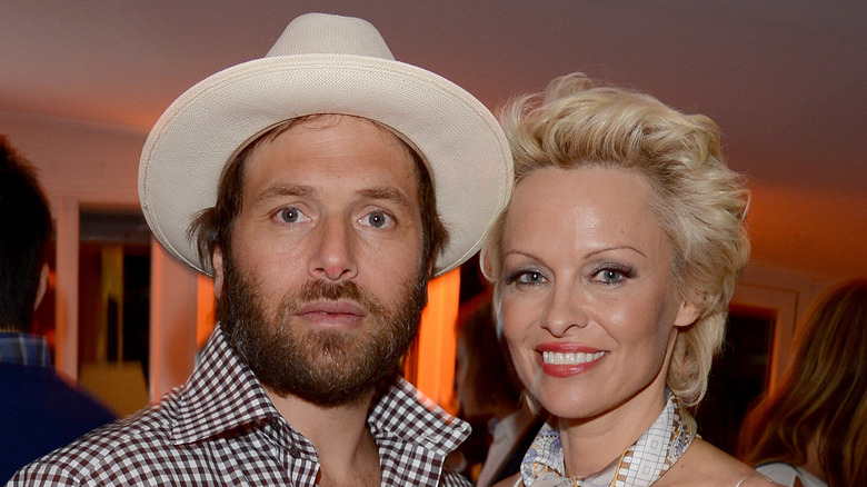 Rick Salomon posant avec Pamela Anderson