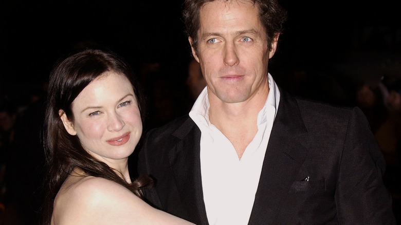 Renee Zellweger souriant avec Hugh Grant