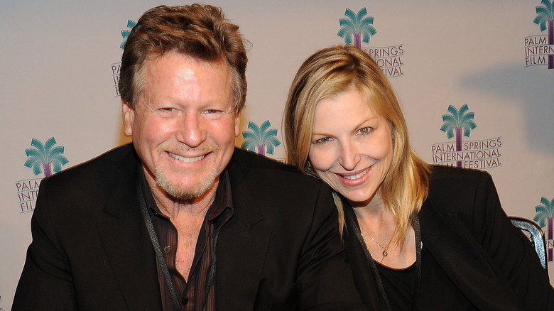 Ryan O'Neal et Tatum O'Neal souriant