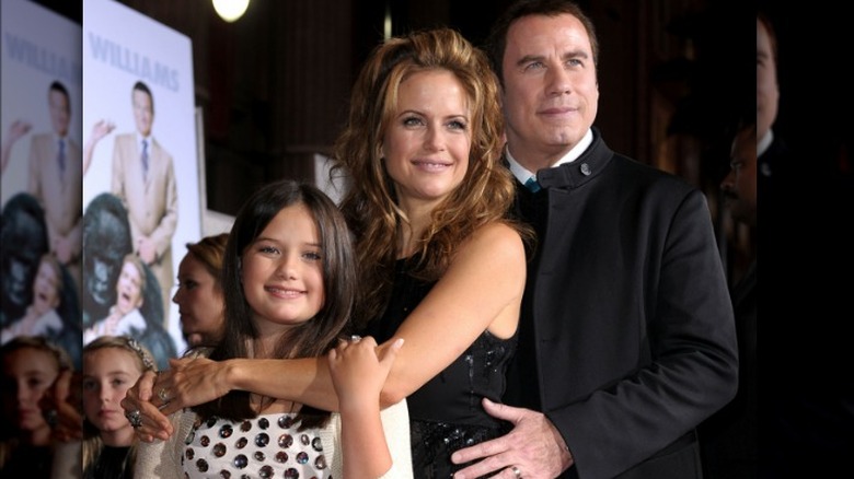 La famille Travolta posant